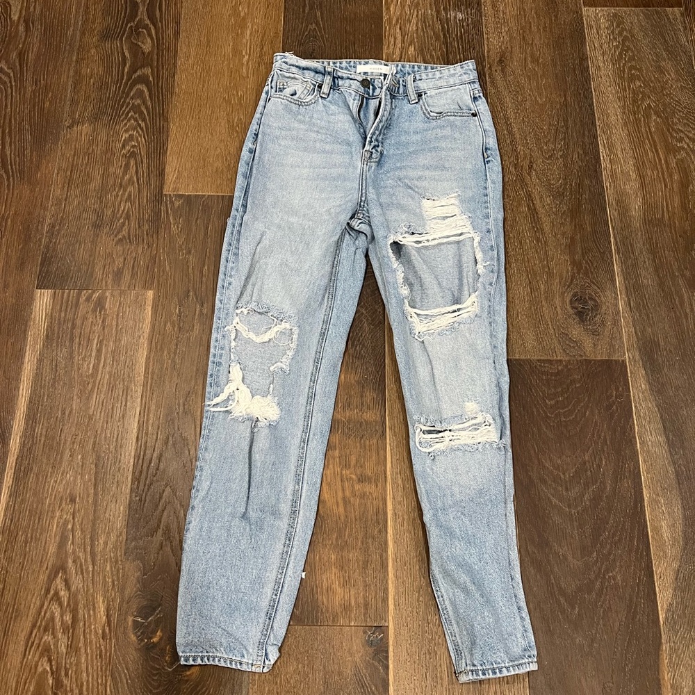 Hidden distressed, light wash jeans. Size 25. **WORN ONCE**
